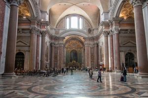 Left transept of Basilica of St. Mary of the Angels and the Martyrs, oculus of the gnomon is on the top right 